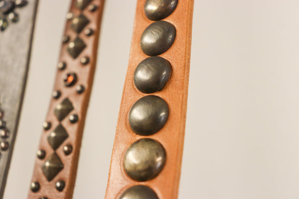 New Studio Belt 404. Honey colored leather with gunmetal bottlecaps. Size 34 only.