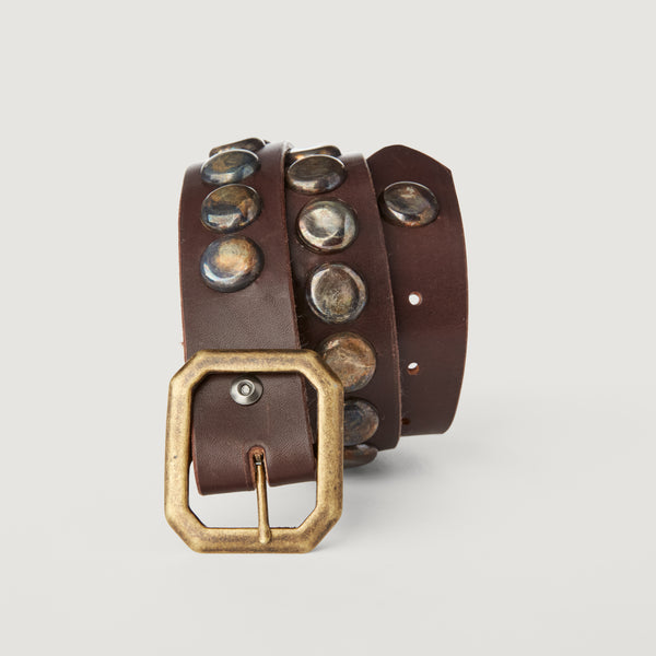 Belt 12: Western-style metal bottlecaps, modernized and refined on brown leather.