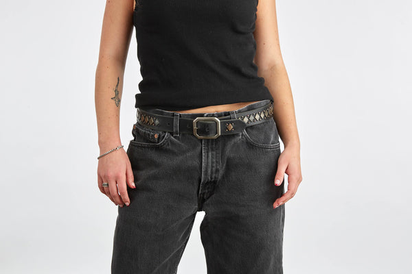 Style 008: Black leather belt with 'argyle' pattern of flat, diamond studs