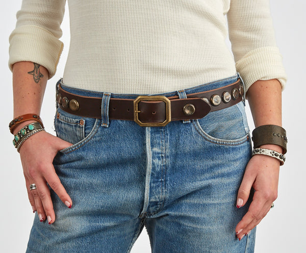 Belt 12: Western-style metal bottlecaps, modernized and refined on brown leather.