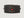 Black leather cuff with metallic studs surrounding a red gemstone 