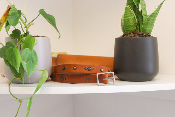 New Studio Belt 405. Slim tan belt with space-age stones. Size 34 only.