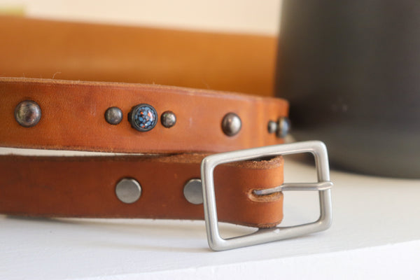 New Studio Belt 405. Slim tan belt with space-age stones. Size 34 only.