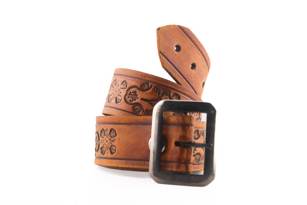 Vintage Studio Belt 62. Natural color with fleur-de-lis tooling. Size 28 only.