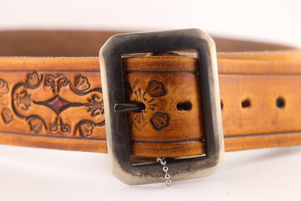 Vintage Studio Belt 62. Natural color with fleur-de-lis tooling. Size 28 only.