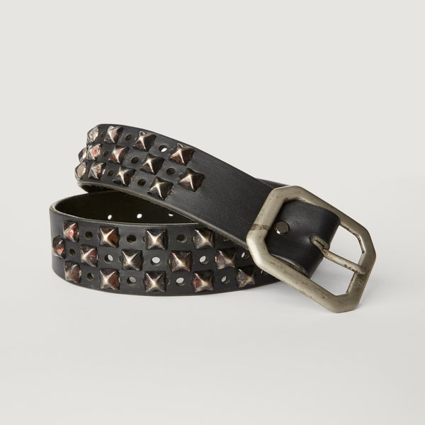 Style 011: Black belt with a repeating pattern of pyramid studs and hole punches