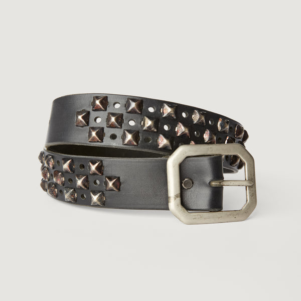 Style 011: Black belt with a repeating pattern of pyramid studs and hole punches