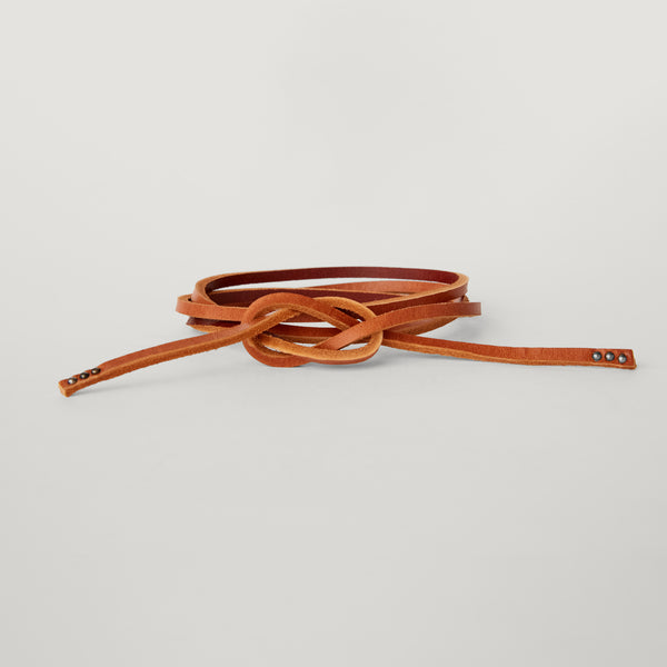 Style 019: Tie belt in Tan leather with studded ends