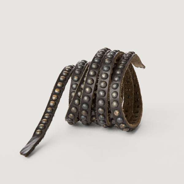 Style 020: Tie belt in Black leather with continuous, small round studding